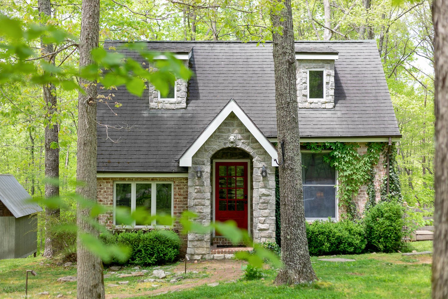 5672 Pinewood Road Franklin, TN 37064 - Photo 29 of 55 a front view of a house with garden