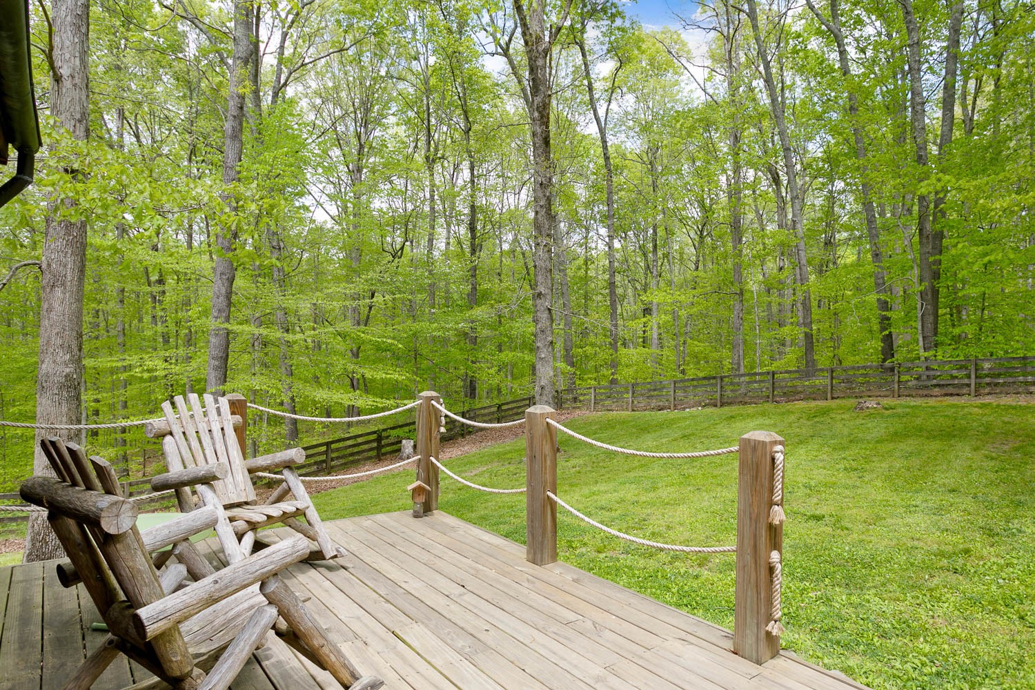 5672 Pinewood Road Franklin, TN 37064 - Photo 46 of 55 a view of a deck with chairs and wooden fence