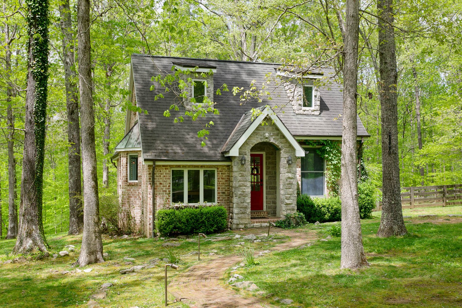 5672 Pinewood Road Franklin, TN 37064 - Photo 5 of 55 a front view of a house with a yard