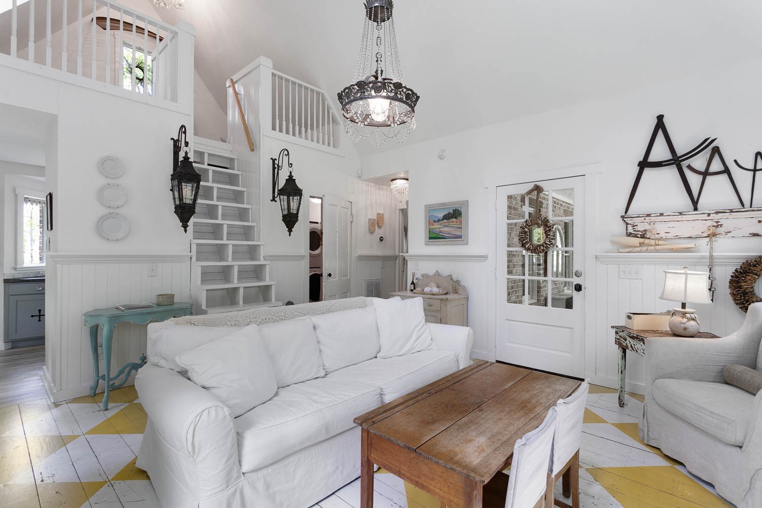 5672 Pinewood Road Franklin, TN 37064 - Photo 8 of 55 a living room with furniture a dining table and a chandelier