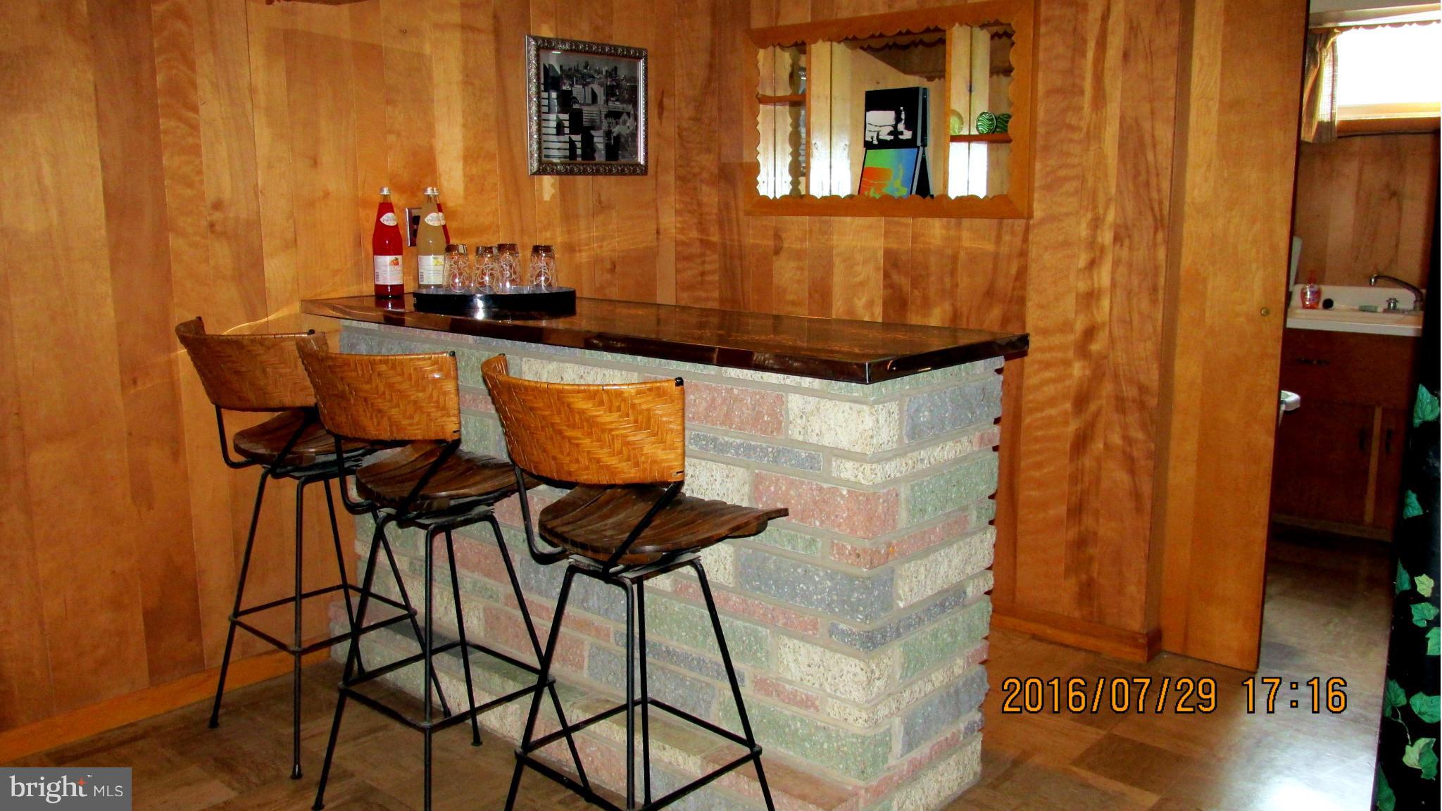 8134 Pleasant Plains Road Baltimore, MD 21286 - Photo 17 of 28 Family Room dry bar--great for entertaining!