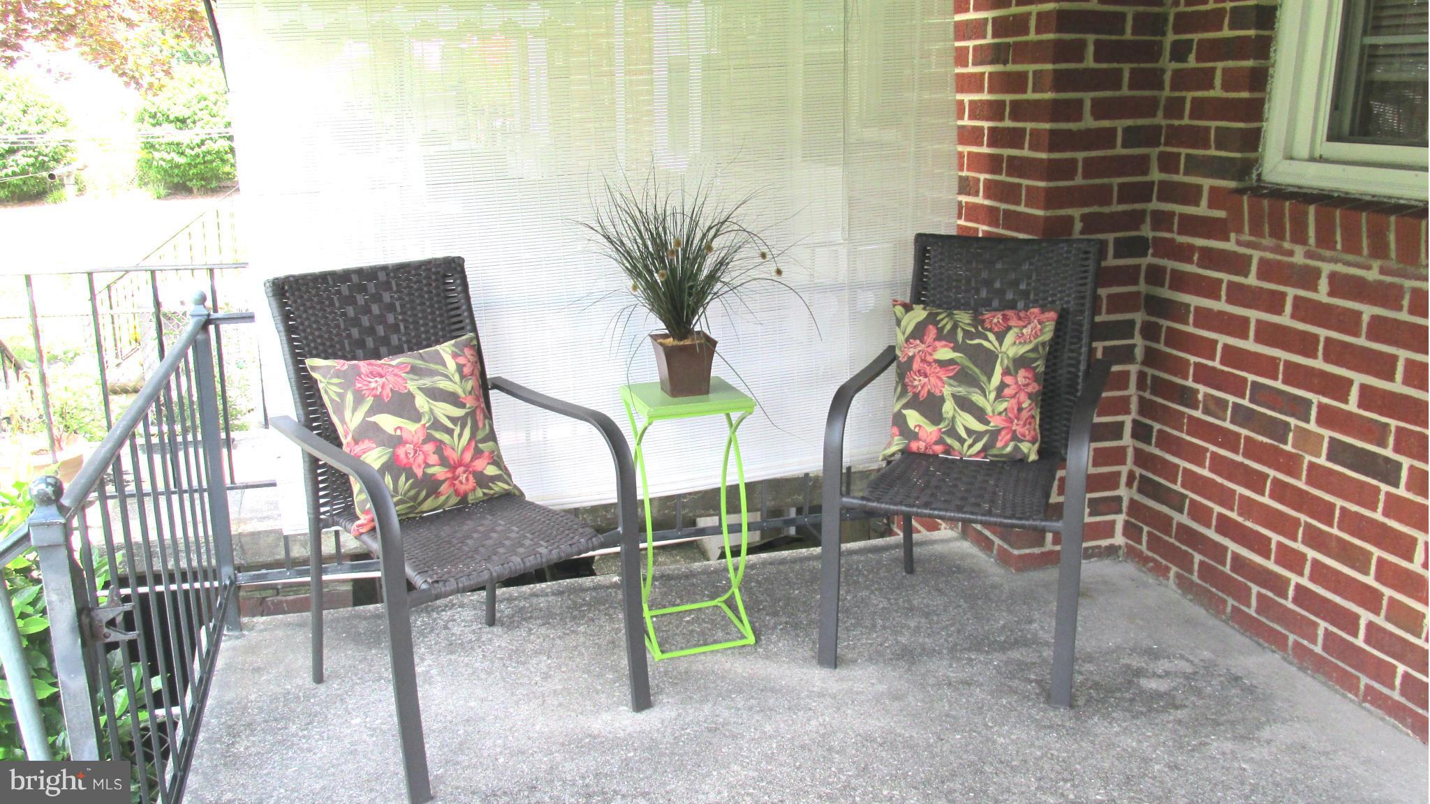 8134 Pleasant Plains Road Baltimore, MD 21286 - Photo 19 of 28 Large rear porch with awning--gated railing!