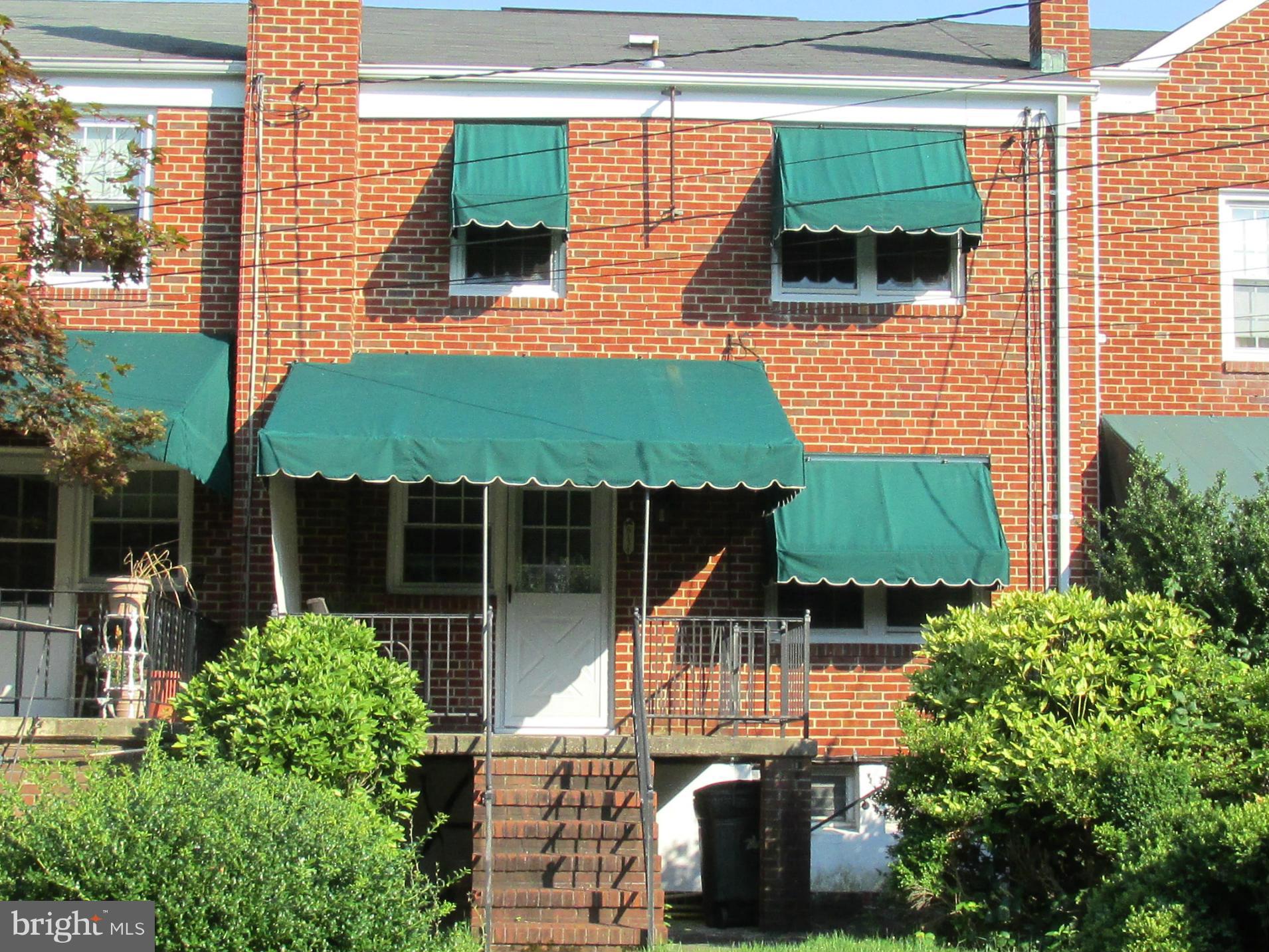 8134 Pleasant Plains Road Baltimore, MD 21286 - Photo 20 of 28 Green awnings provide cooling shade!