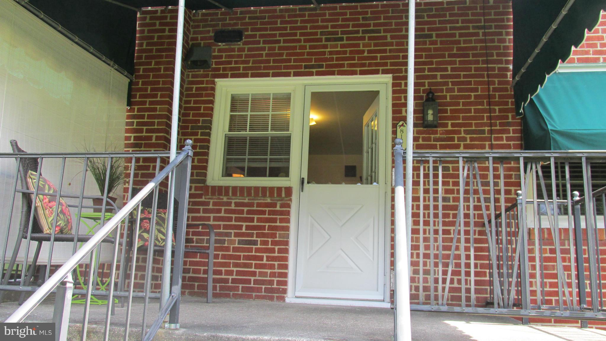 8134 Pleasant Plains Road Baltimore, MD 21286 - Photo 21 of 28 View of porch from backyard.