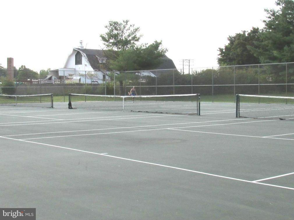 8134 Pleasant Plains Road Baltimore, MD 21286 - Photo 26 of 28 Tennis courts--with historic barn in background!