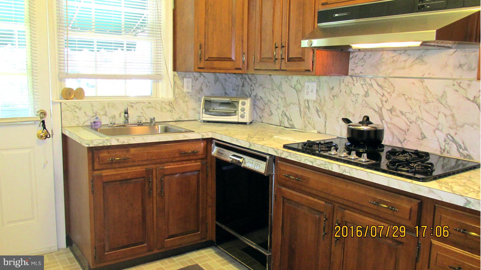 8134 Pleasant Plains Road Baltimore, MD 21286 - Photo 7 of 28 Bright kitchen with earlier updates.