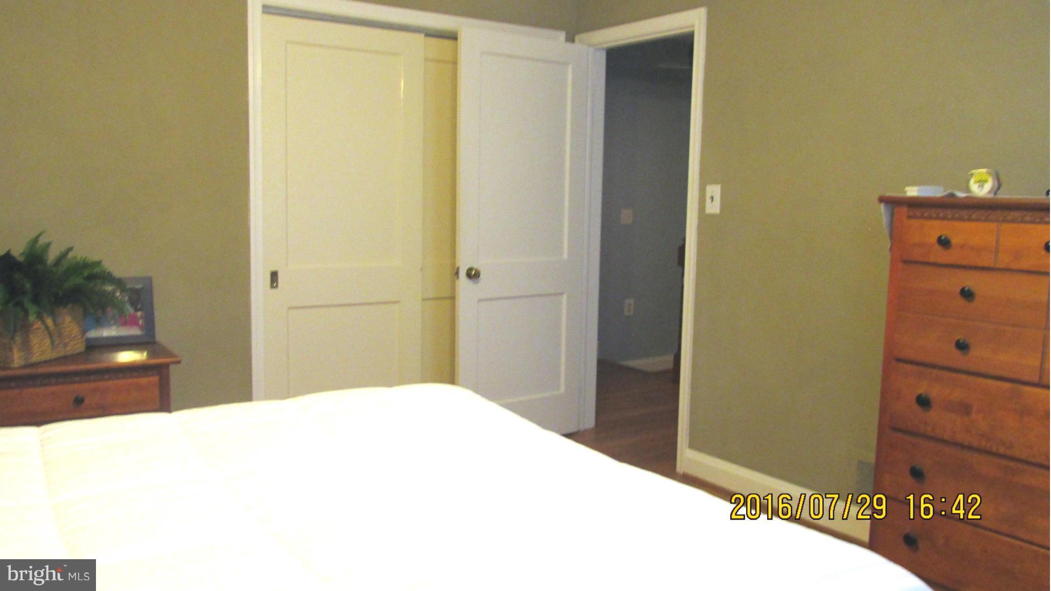 8134 Pleasant Plains Road Baltimore, MD 21286 - Photo 10 of 28 Master BR--view towards hallway w/double closet.
