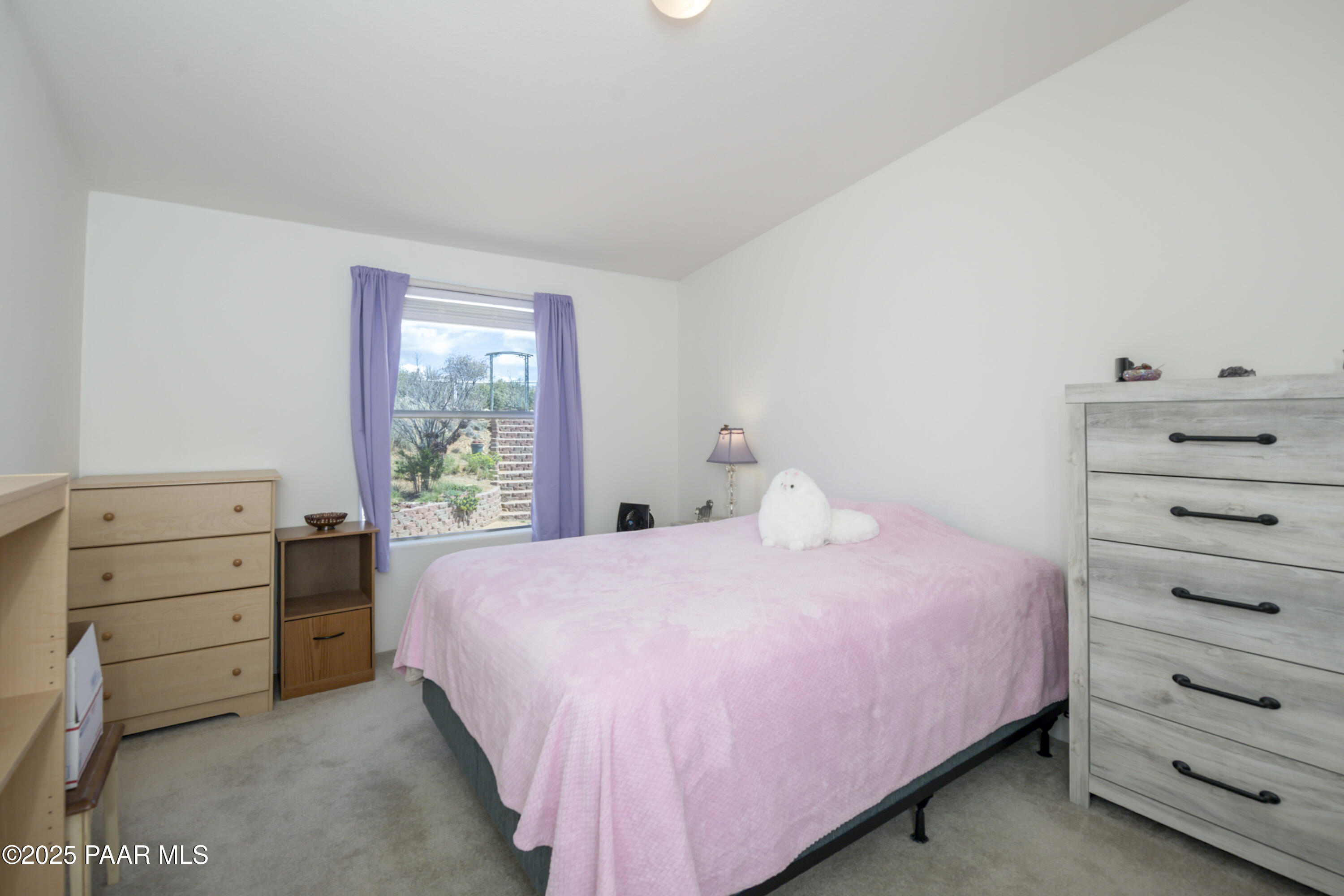 17985 East Hunters Lane Dewey, AZ 86327 - Photo 17 of 41 a bedroom with a bed and a dresser