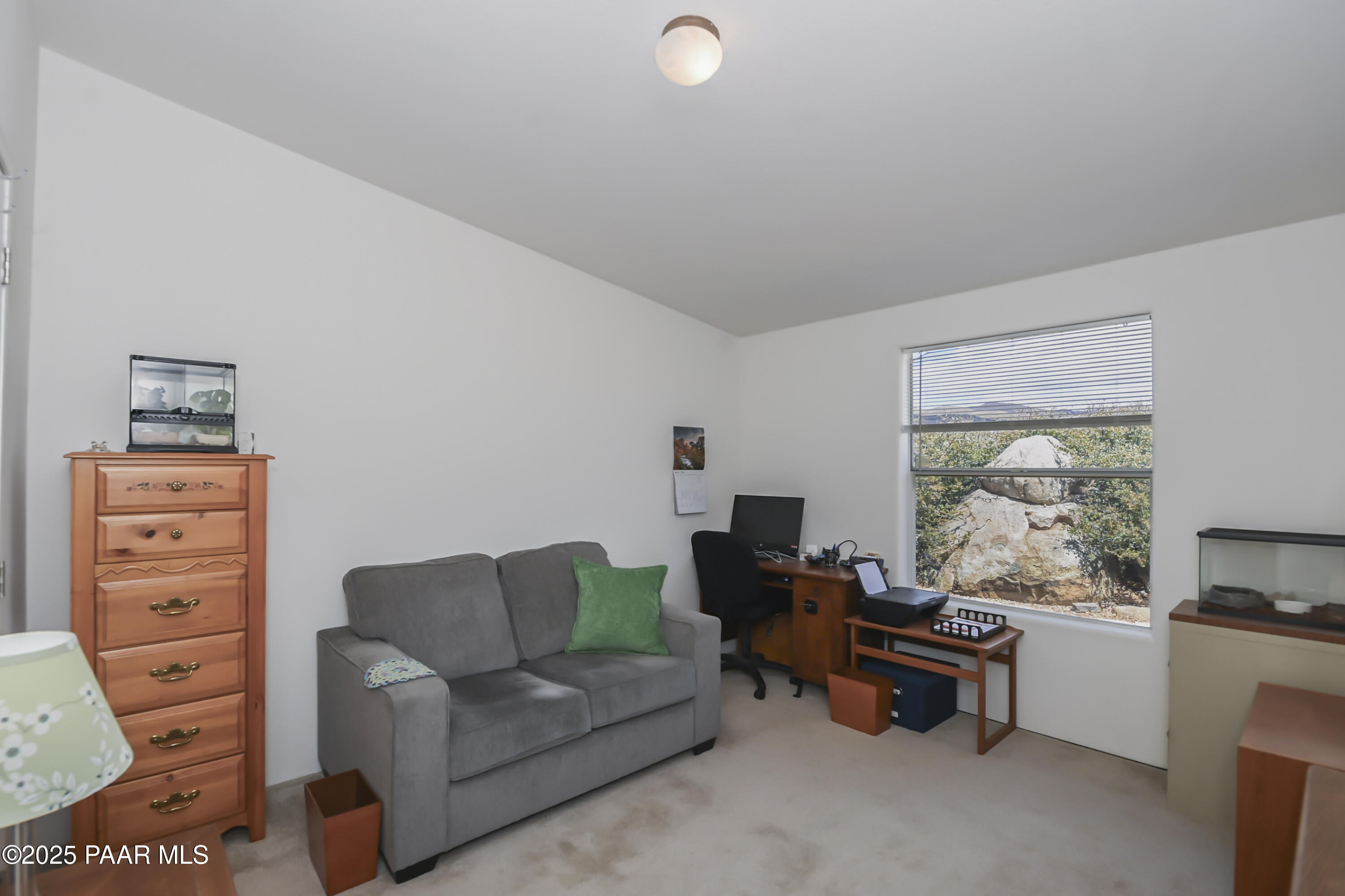 17985 East Hunters Lane Dewey, AZ 86327 - Photo 21 of 41 a living room with furniture and a flat screen tv