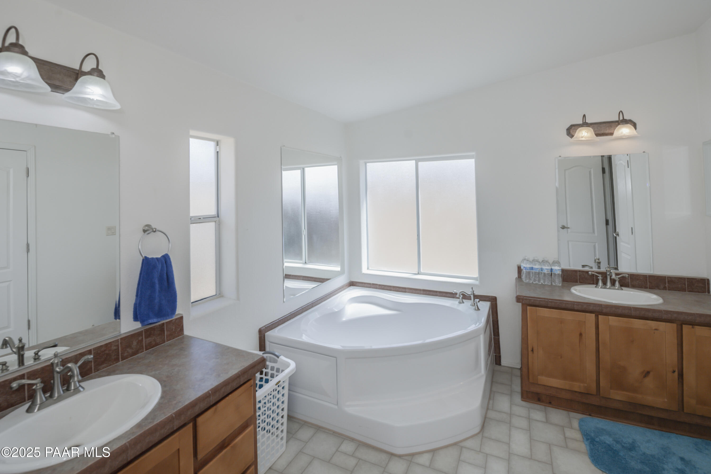 17985 East Hunters Lane Dewey, AZ 86327 - Photo 27 of 41 a bathroom with a granite countertop sink and a mirror