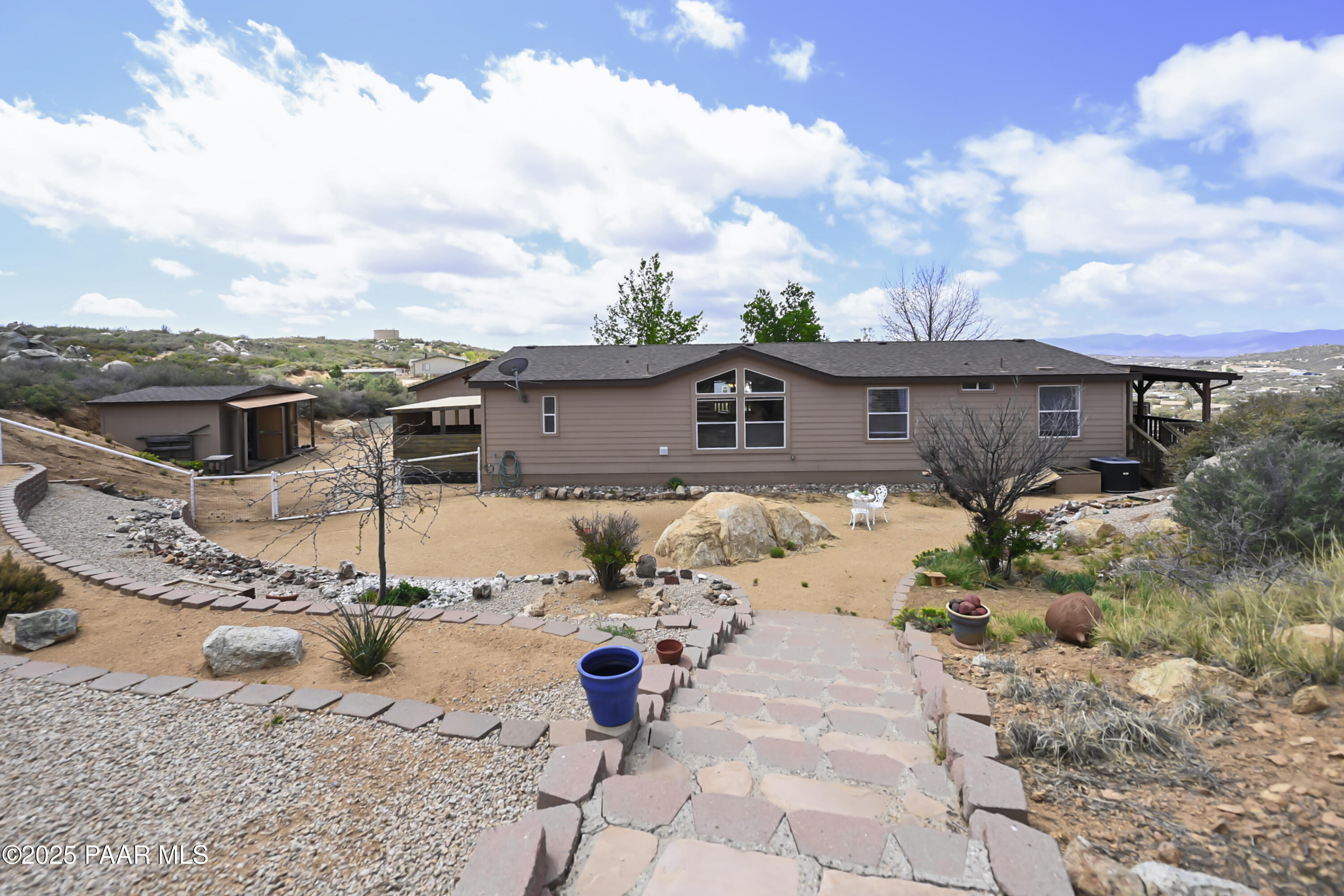 17985 East Hunters Lane Dewey, AZ 86327 - Photo 36 of 41 a view of a terrace with a barbeque