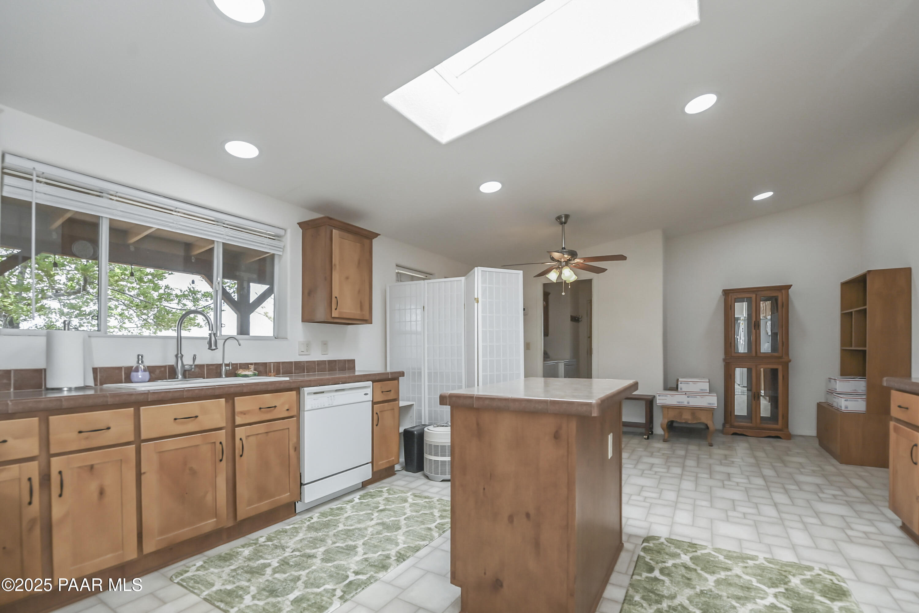 17985 East Hunters Lane Dewey, AZ 86327 - Photo 10 of 41 a kitchen with stainless steel appliances granite countertop a sink and cabinets