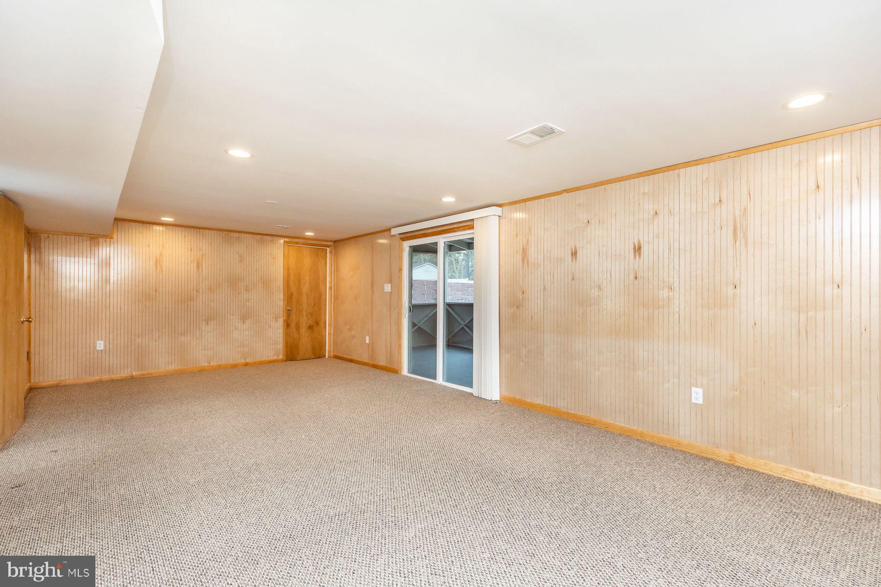 8122 Scotts Level Road Baltimore, MD 21208 - Photo 12 of 18 Huge finished basement w/walk out