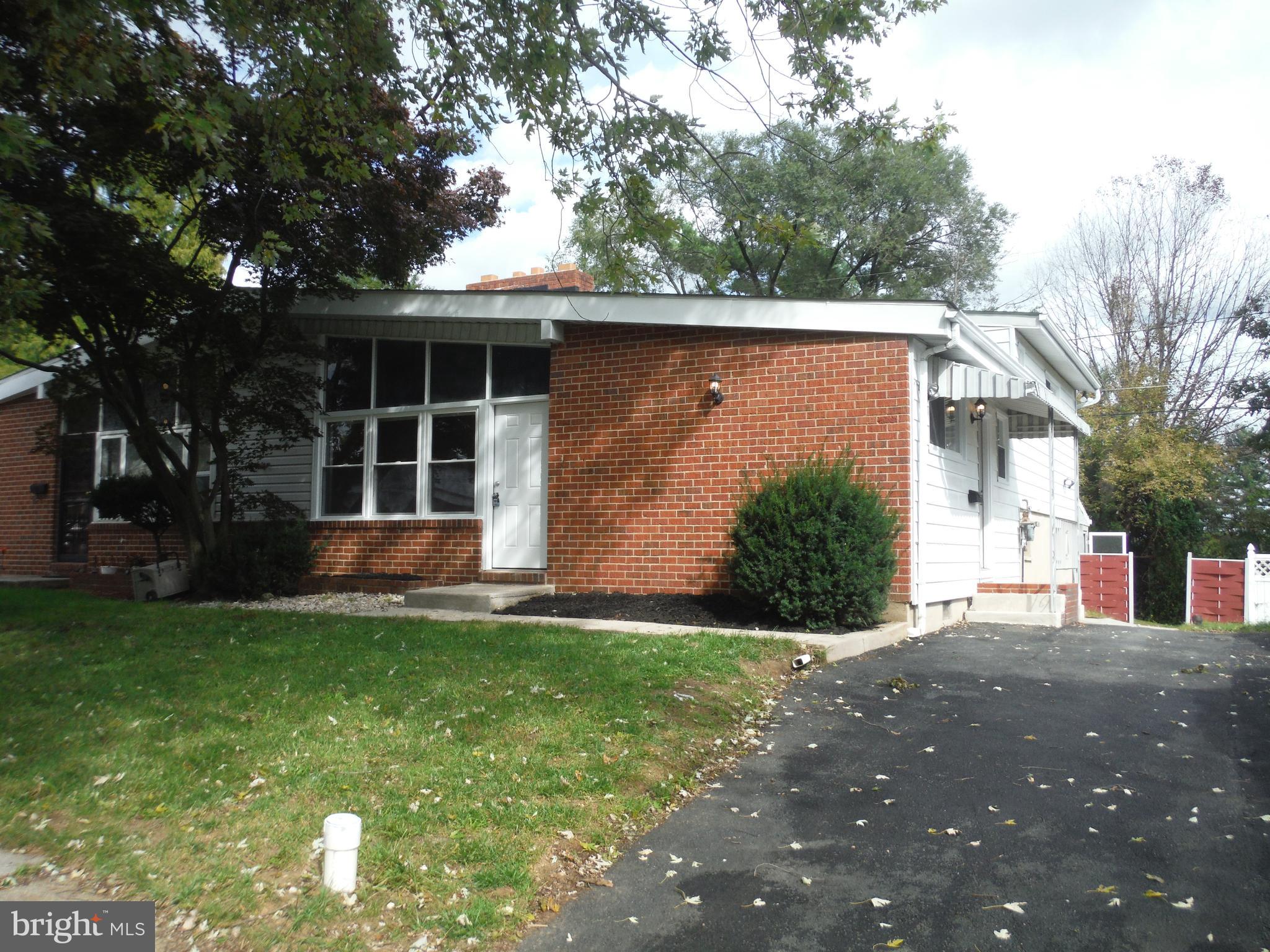 8122 Scotts Level Road Baltimore, MD 21208 - Photo 17 of 18 Large home with fenced back yard