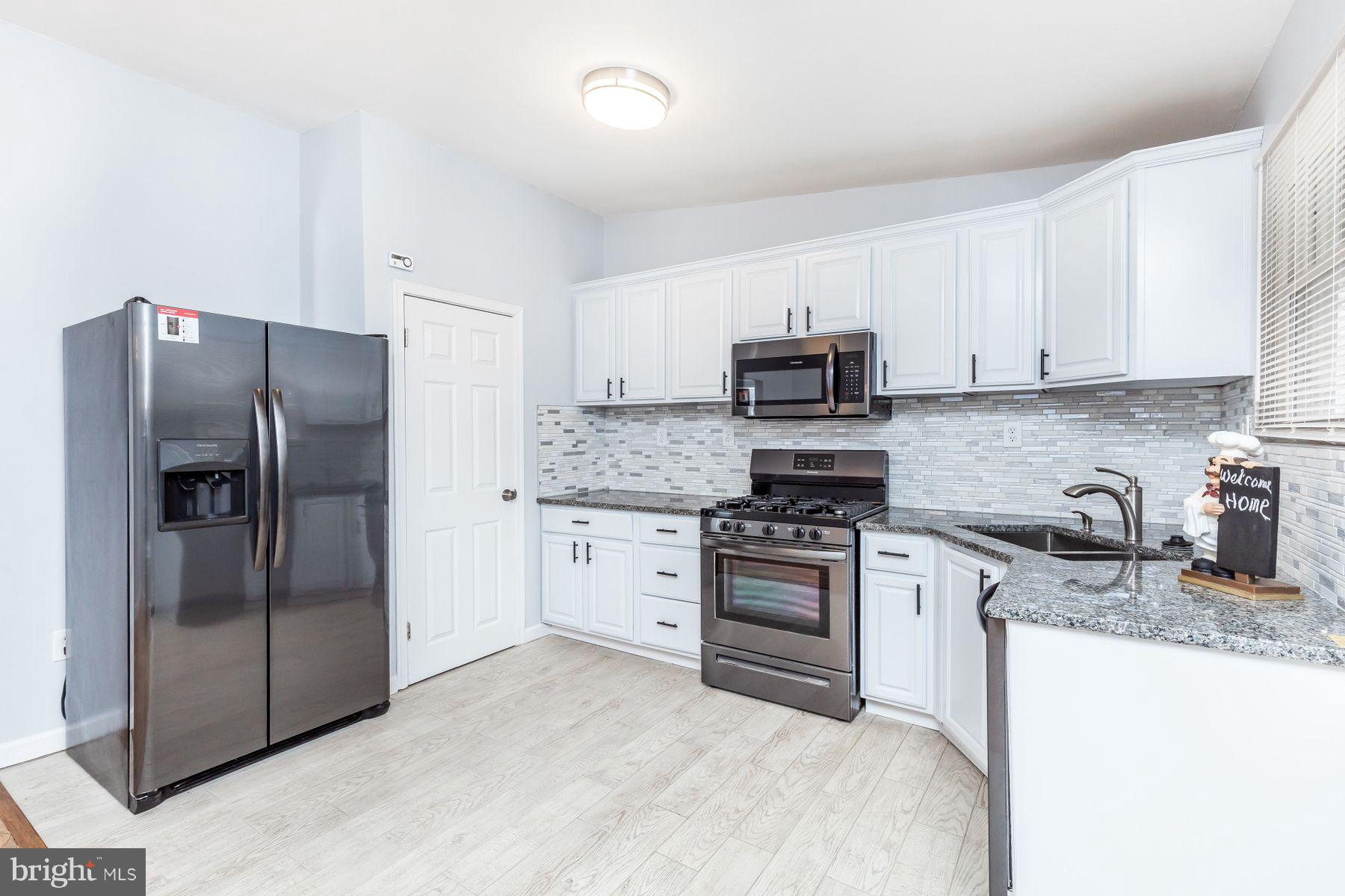 8122 Scotts Level Road Baltimore, MD 21208 - Photo 2 of 18 New dark SS appliances