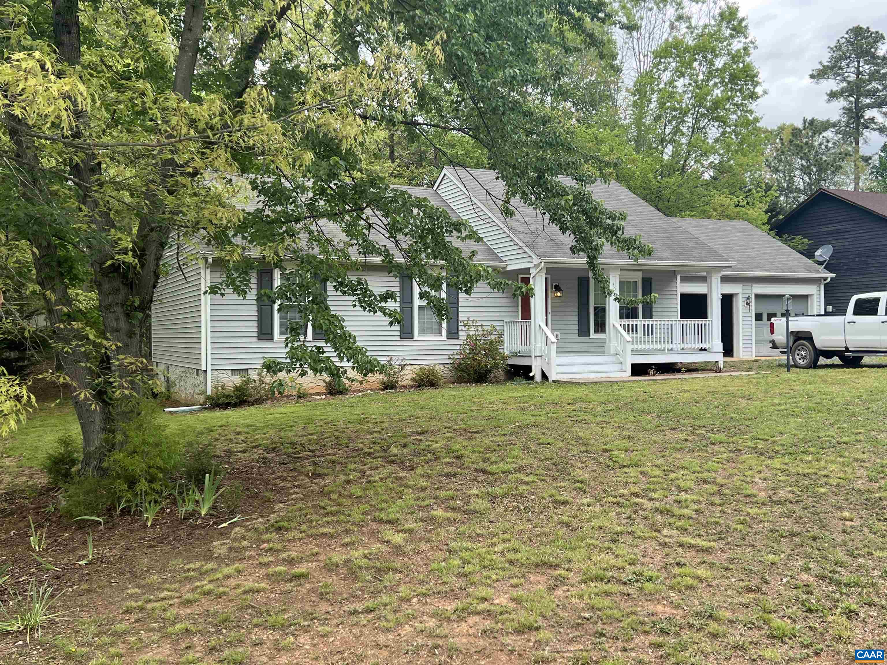30 Haversack Road Palmyra, VA 22963 - Photo 1 of 31 a front view of a house with a garden