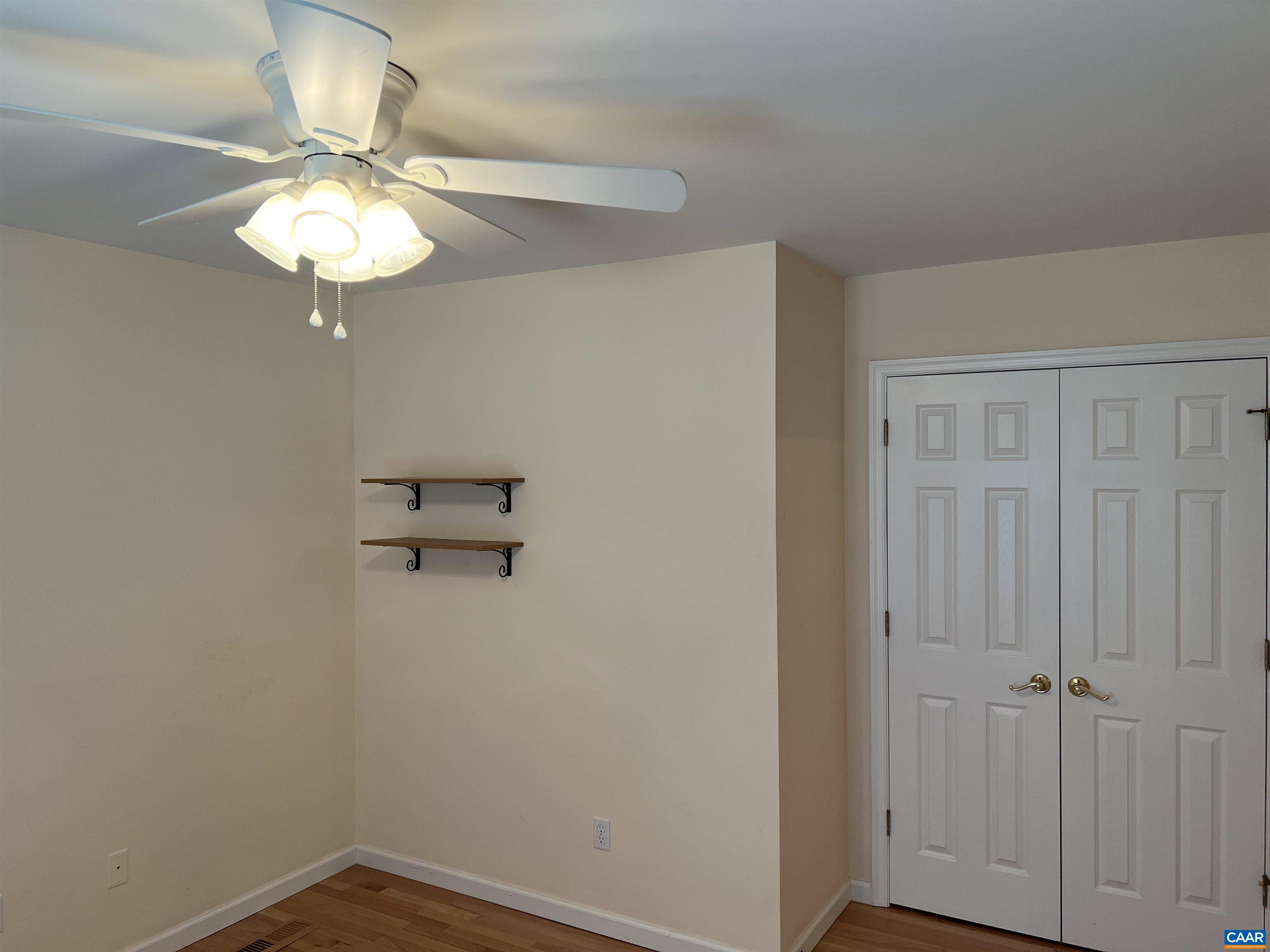 30 Haversack Road Palmyra, VA 22963 - Photo 18 of 31 a view of a chandelier fan and wooden floor