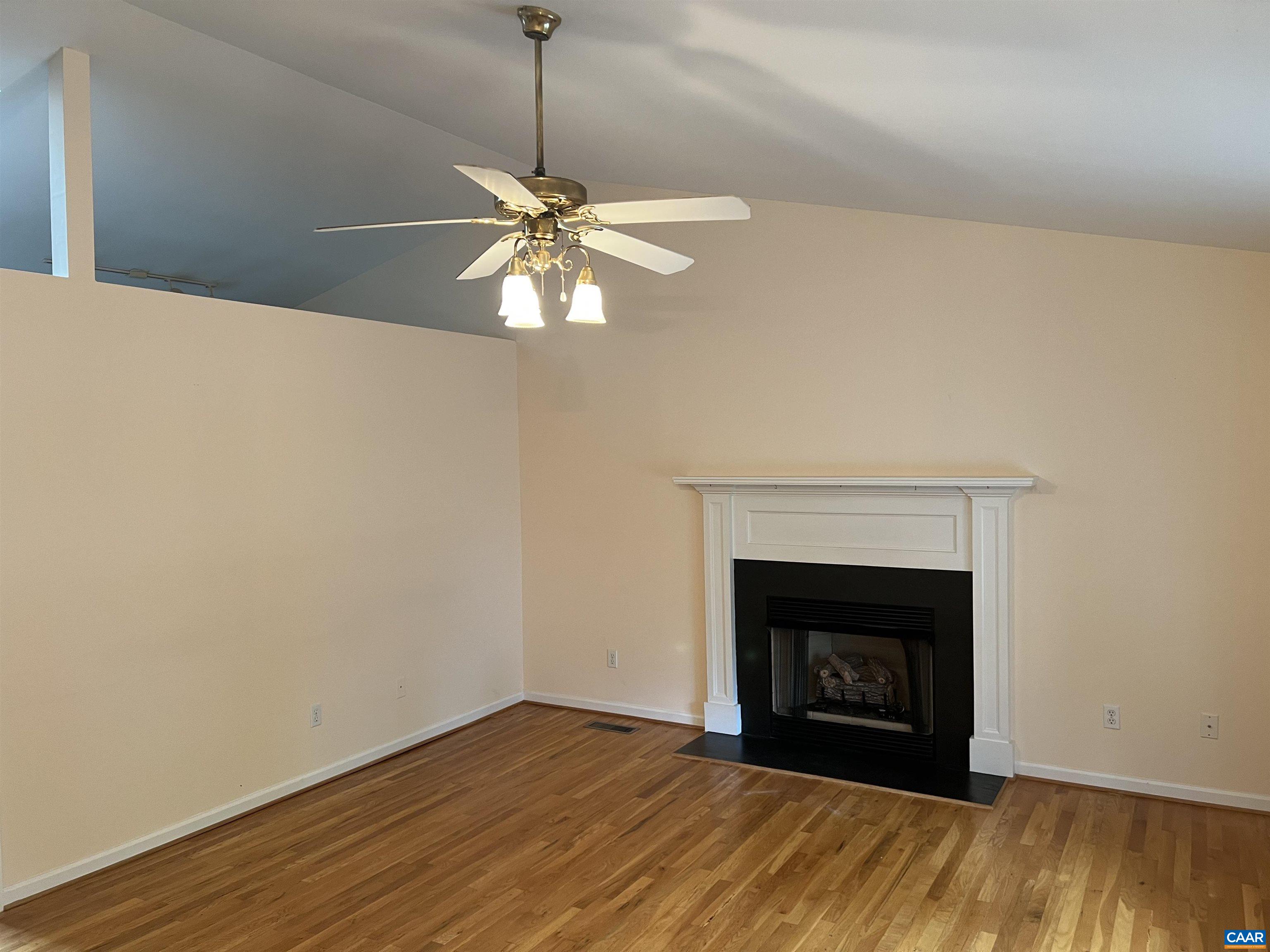 30 Haversack Road Palmyra, VA 22963 - Photo 5 of 31 a view of a room with a fireplace and wooden floor
