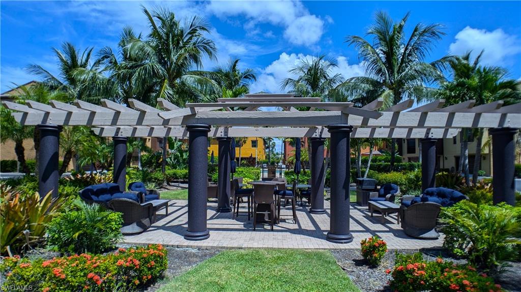 9051 Capistrano Street North, Unit 4308 Naples, FL 34113 - Photo 21 of 45 a view of outdoor space yard and patio