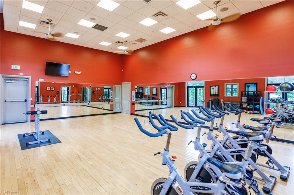 9051 Capistrano Street North, Unit 4308 Naples, FL 34113 - Photo 31 of 45 a view of a room with gym equipment