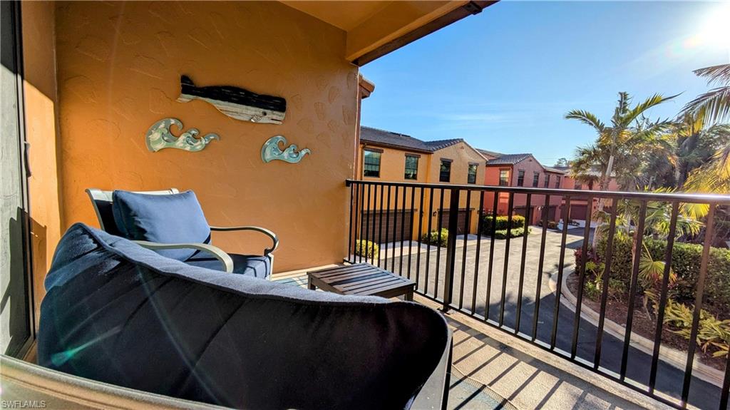 9051 Capistrano Street North, Unit 4308 Naples, FL 34113 - Photo 8 of 45 a view of balcony with furniture