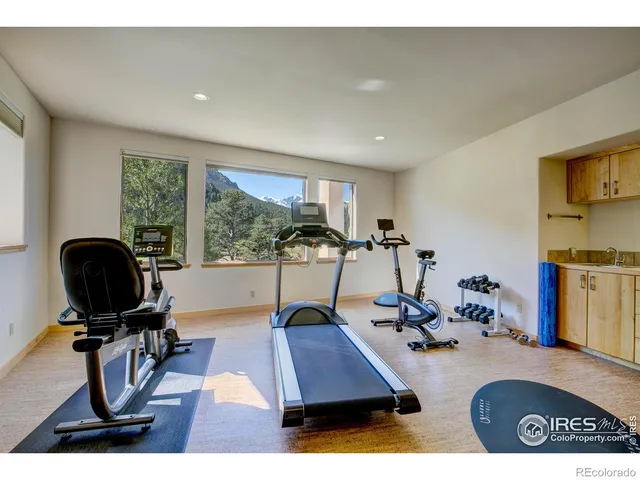 a view of a workspace with furniture and floor