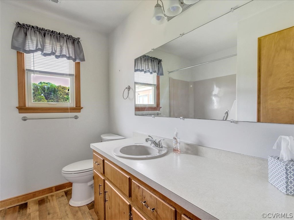 6881 Miller Road Richmond, VA 23231 - Photo 15 of 23 Full bath in hall has large vanity and linen close
