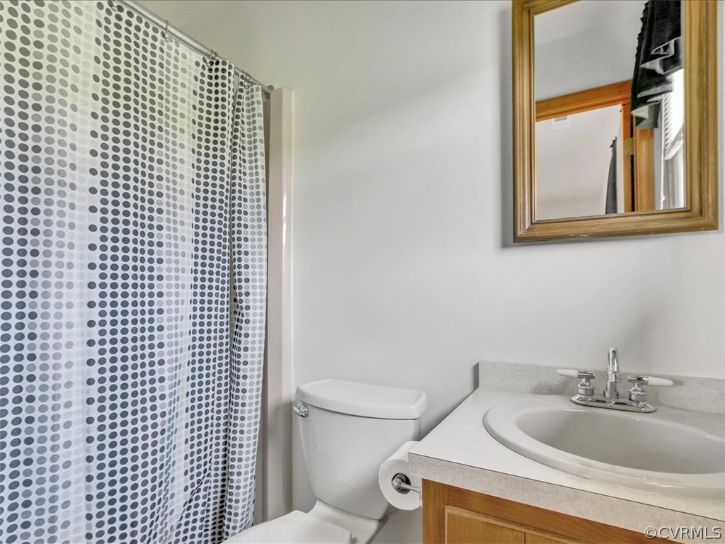 6881 Miller Road Richmond, VA 23231 - Photo 16 of 23 Bathroom off primary bedroom.