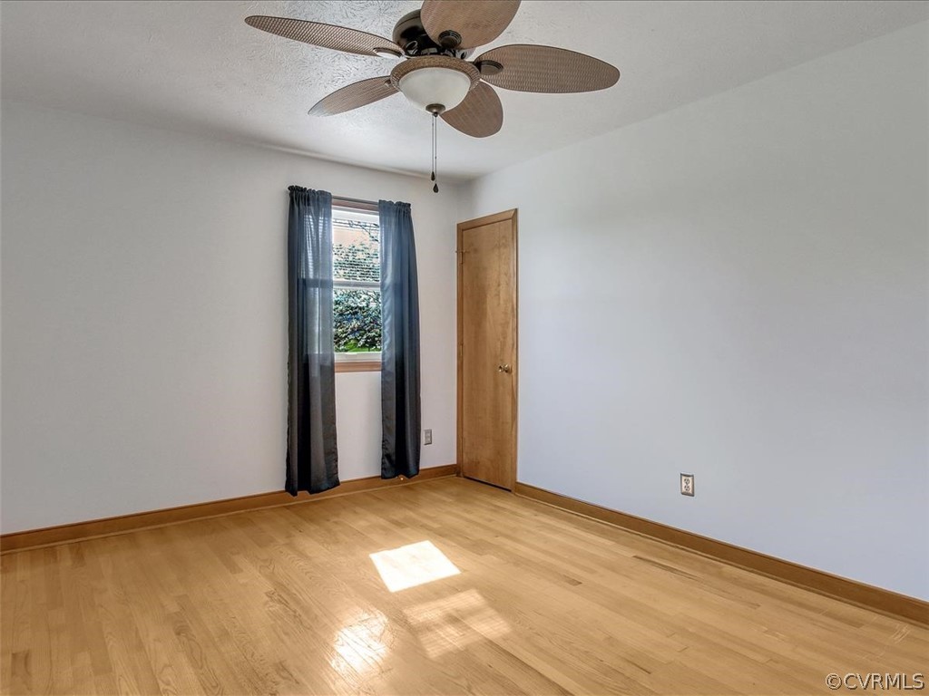6881 Miller Road Richmond, VA 23231 - Photo 17 of 23 Primary bedroom with two closets and bath.