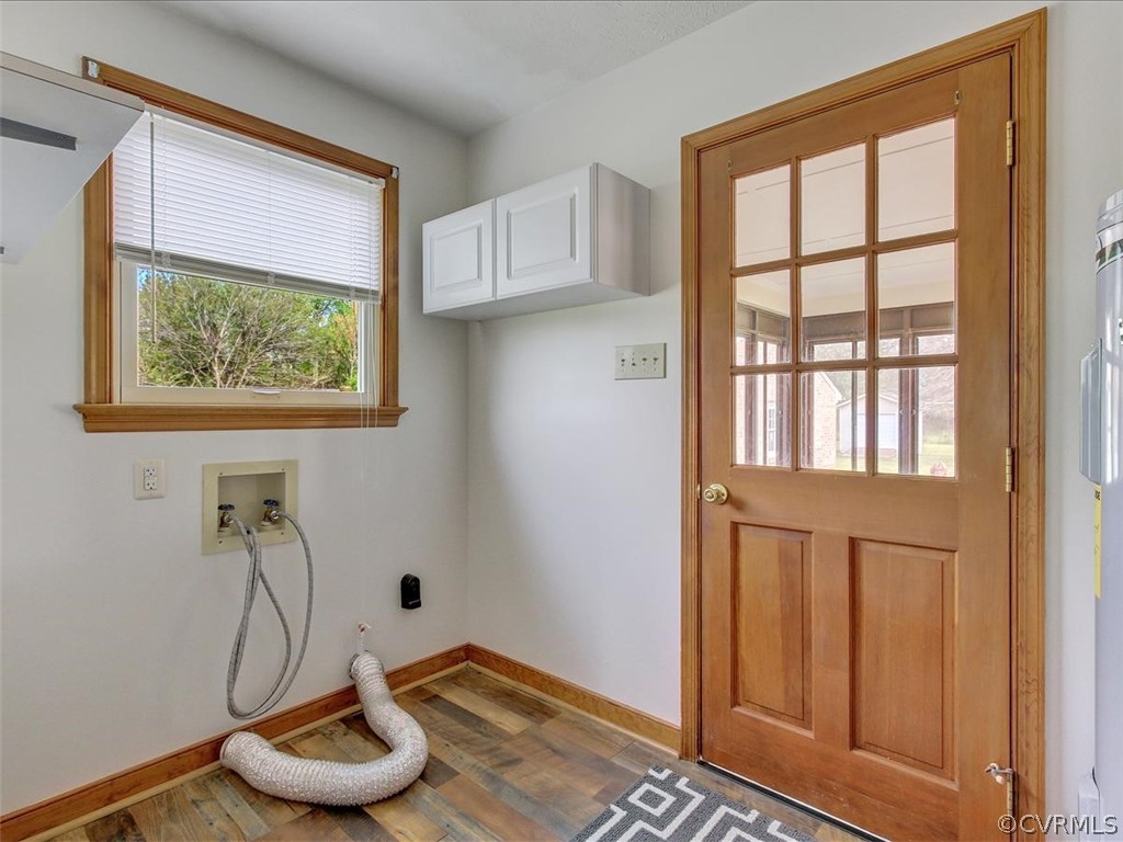 6881 Miller Road Richmond, VA 23231 - Photo 23 of 23 Utility room with new Pergo flooring and new elect