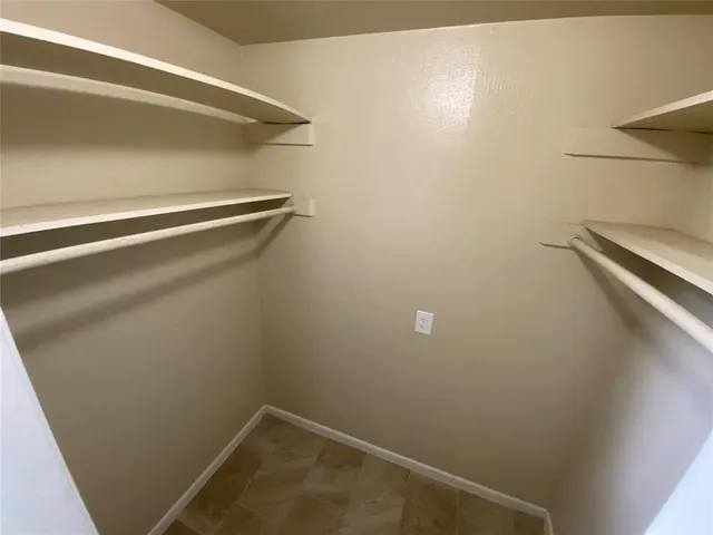 a view of a room with racks on the wall