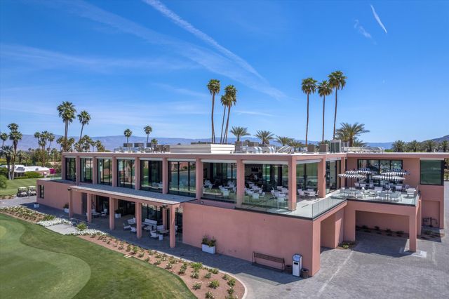 a view of a large building with a ocean view