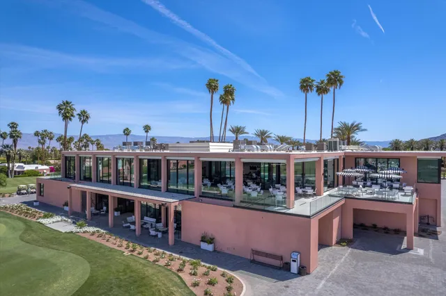 a view of a large building with a ocean view
