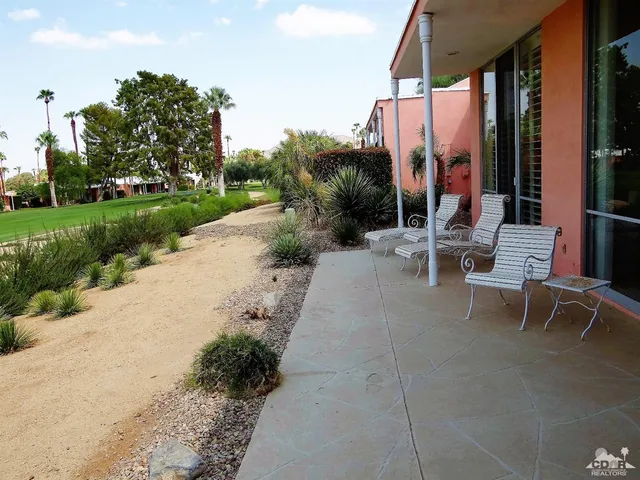 a view of garden with patio