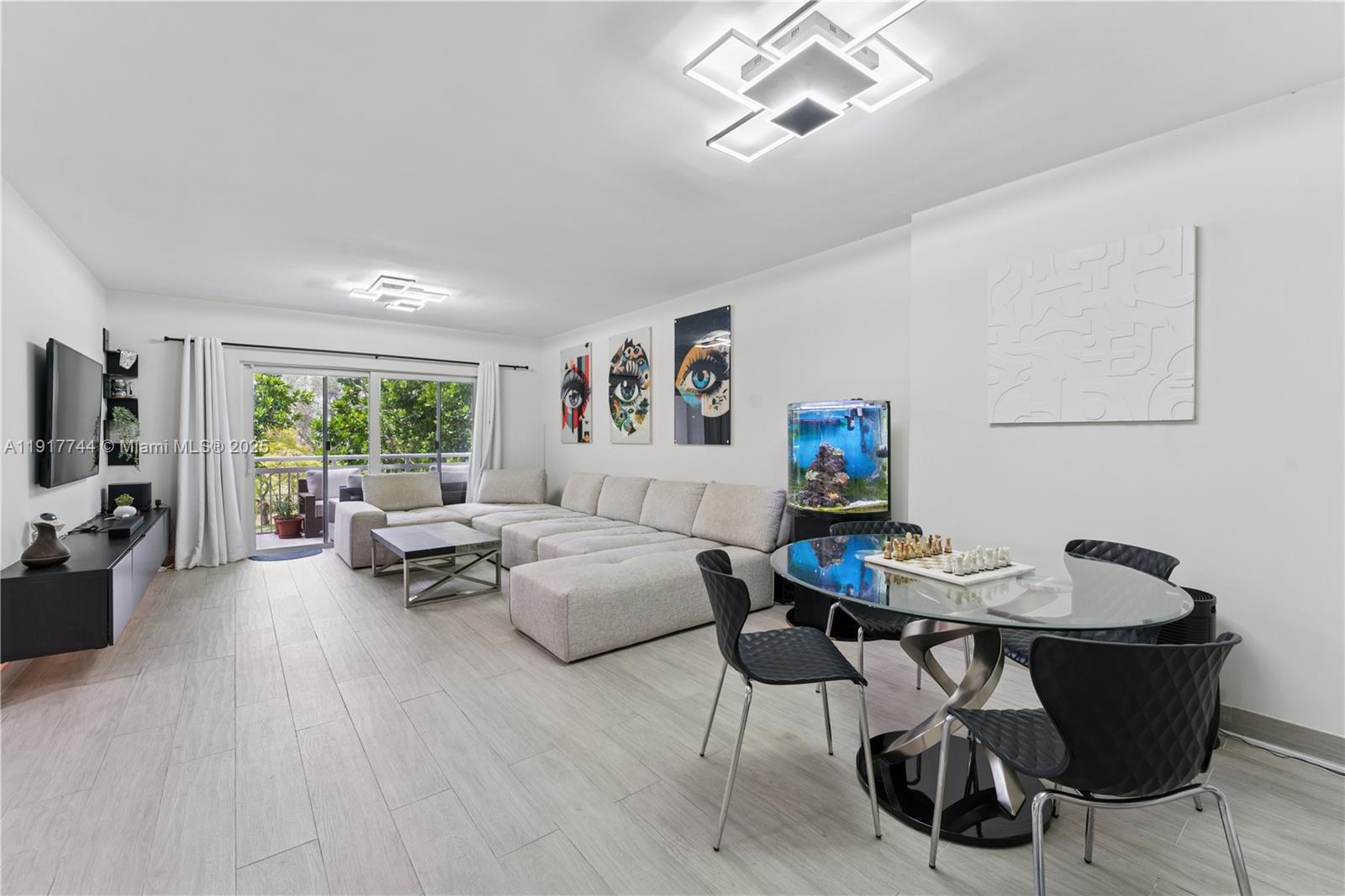 a living room with furniture and a table