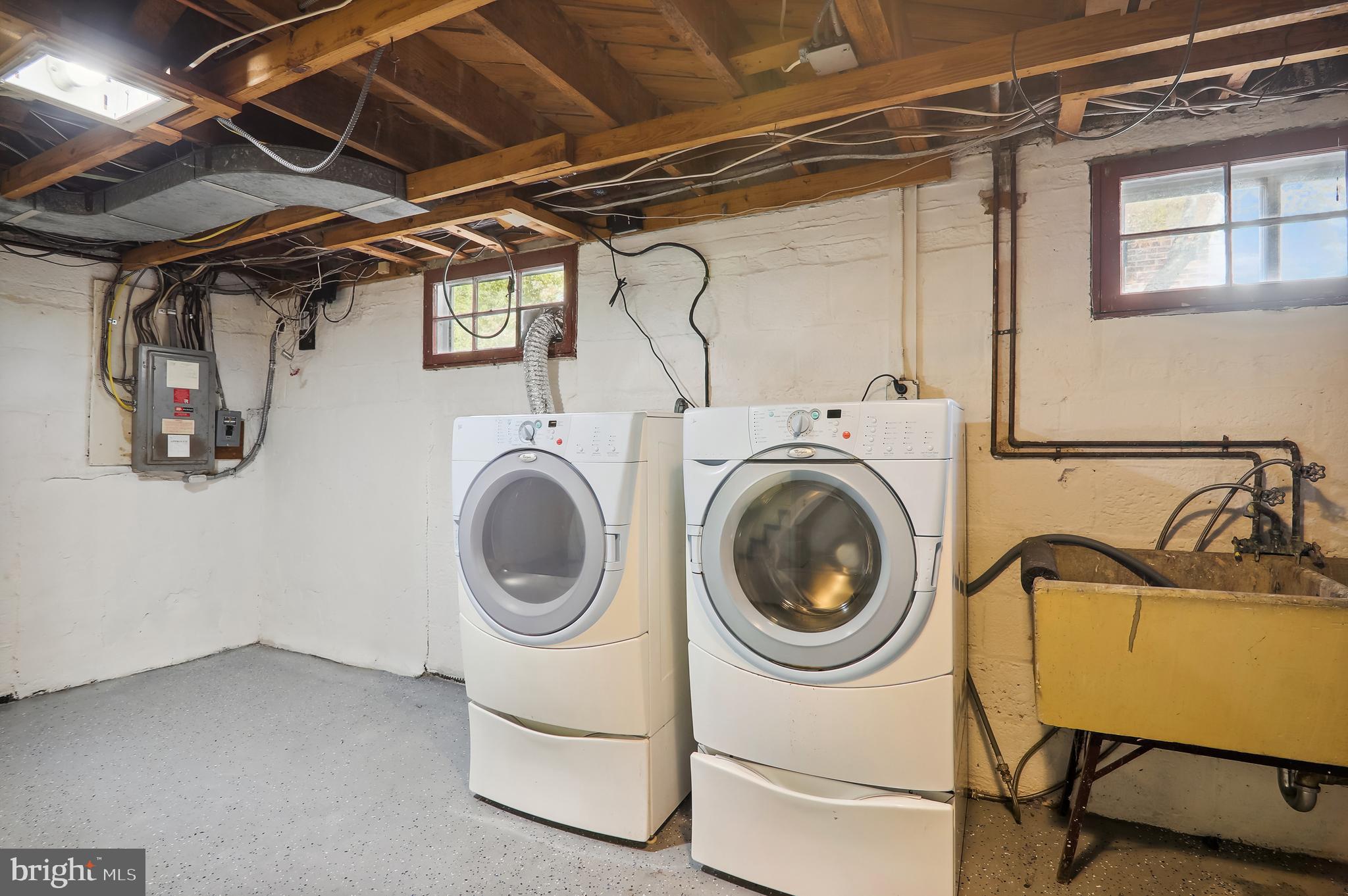 2116 Cascade Road Silver Spring, MD 20902 - Photo 28 of 53 Lower Level with Front Loading Washer & Dryer