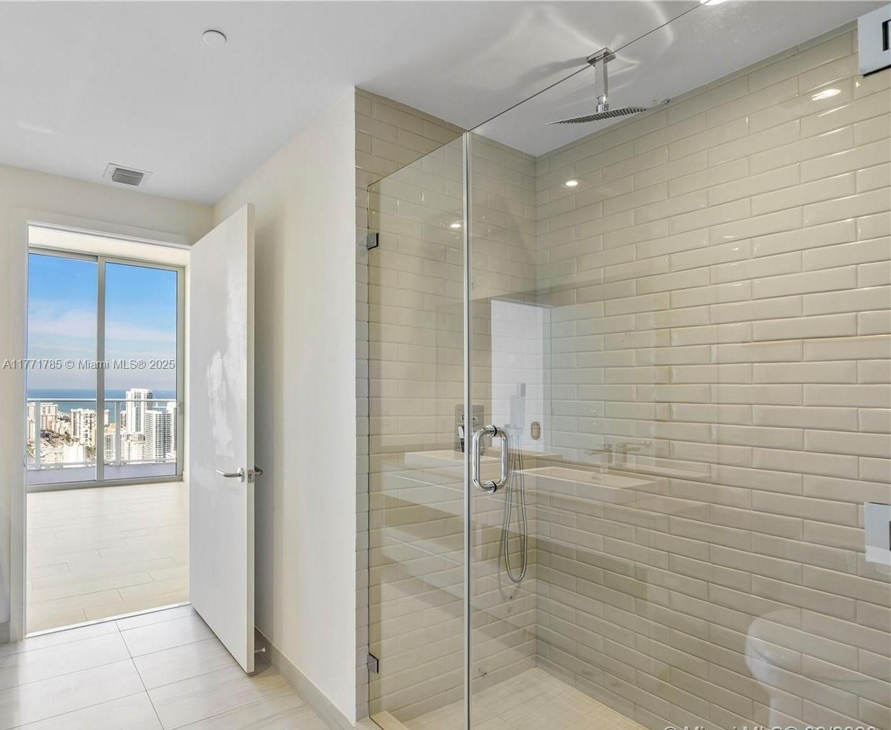 4010 South Ocean Drive, Unit T4301 Hollywood, FL 33019 - Photo 6 of 10 a bathroom with a shower and a sink