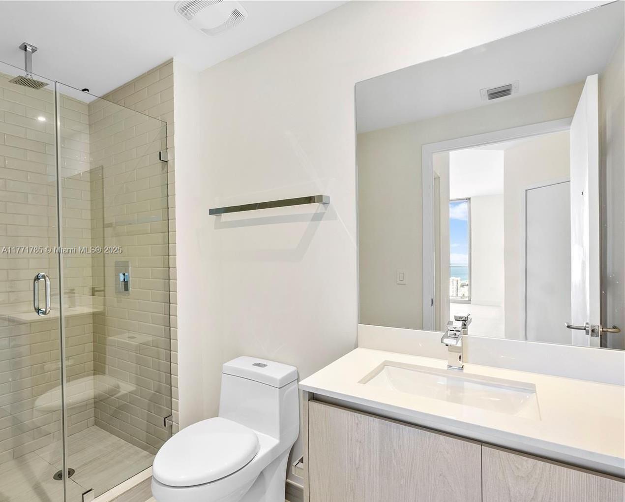 4010 South Ocean Drive, Unit T4301 Hollywood, FL 33019 - Photo 8 of 10 a bathroom with a sink toilet and shower