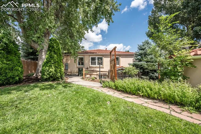 a house view with a garden space