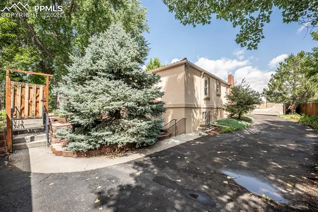 a view of a house with a street