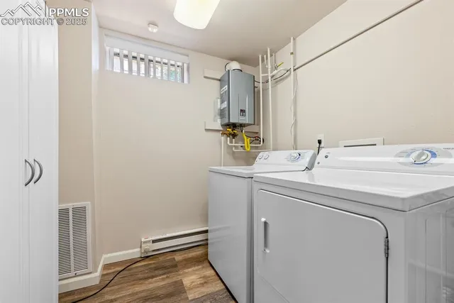 a utility room with dryer and washer