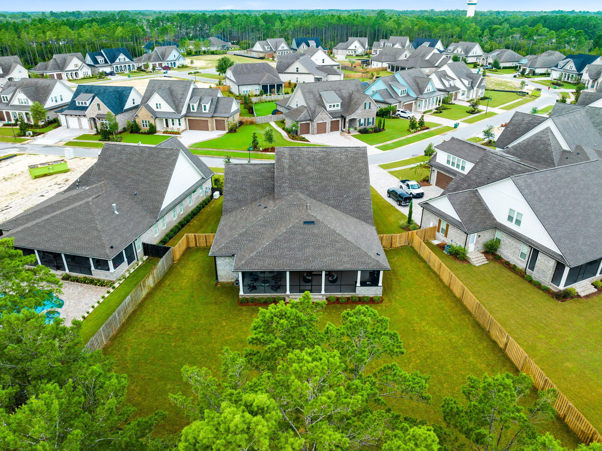 92 Revana Way Freeport, FL 32439 - Photo 16 of 59 an aerial view of a house with a swimming pool yard and outdoor seating