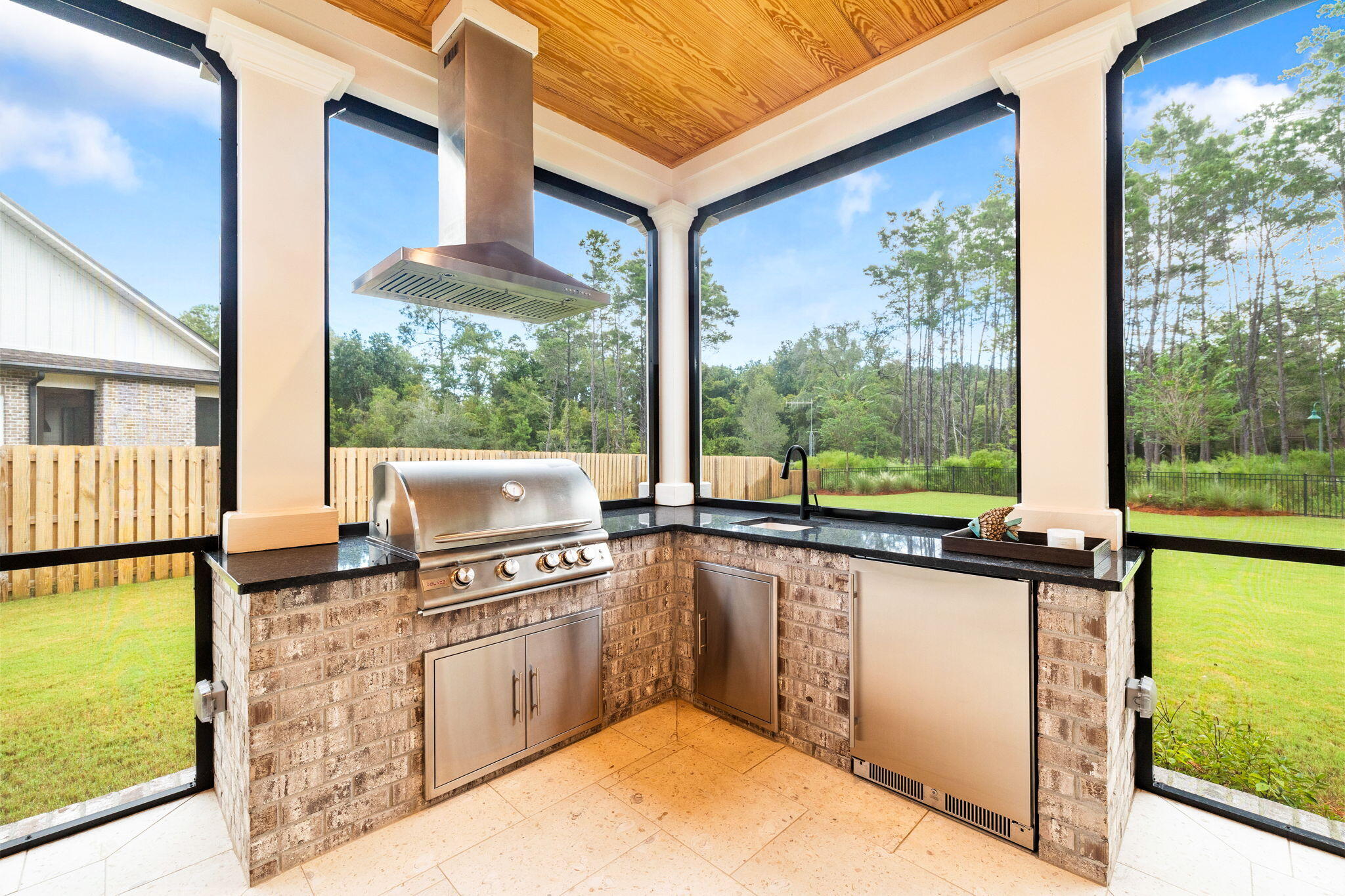 92 Revana Way Freeport, FL 32439 - Photo 22 of 59 a kitchen with a stove a sink and a refrigerator