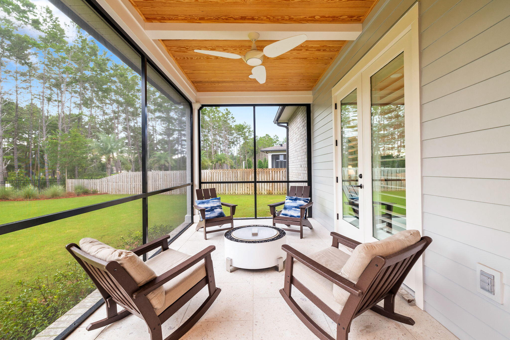 92 Revana Way Freeport, FL 32439 - Photo 5 of 59 a building outdoor space with patio furniture and garden