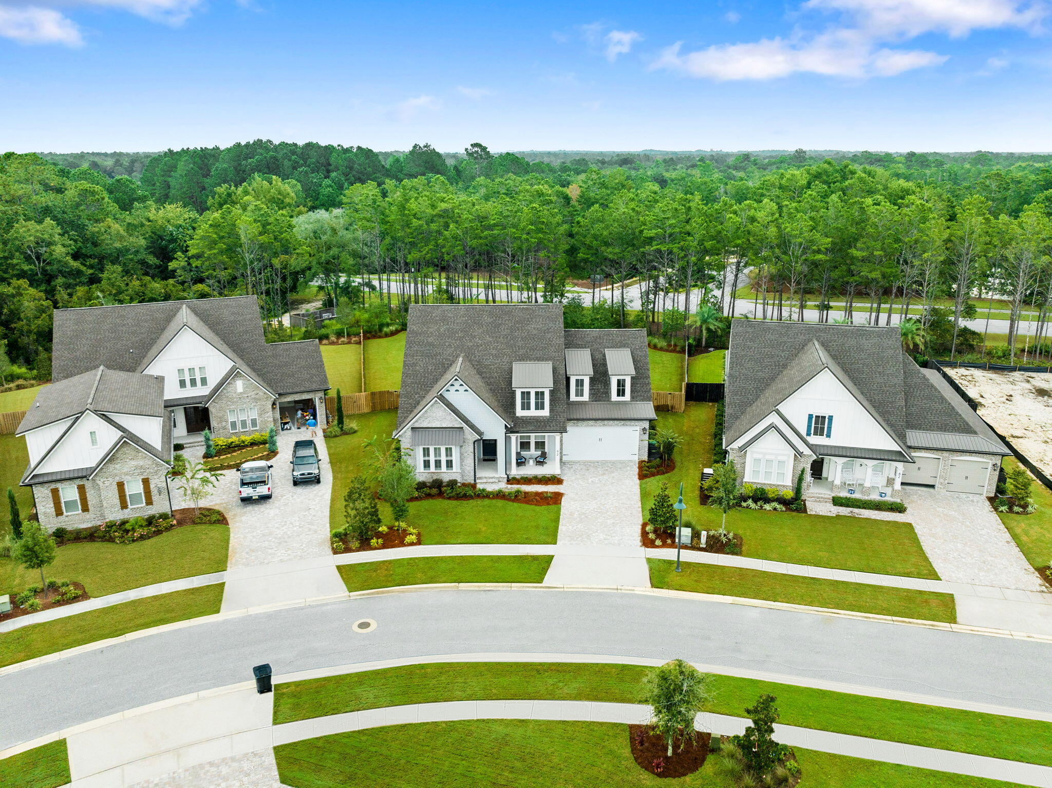 92 Revana Way Freeport, FL 32439 - Photo 10 of 59 a view of a swimming pool with a patio and a yard