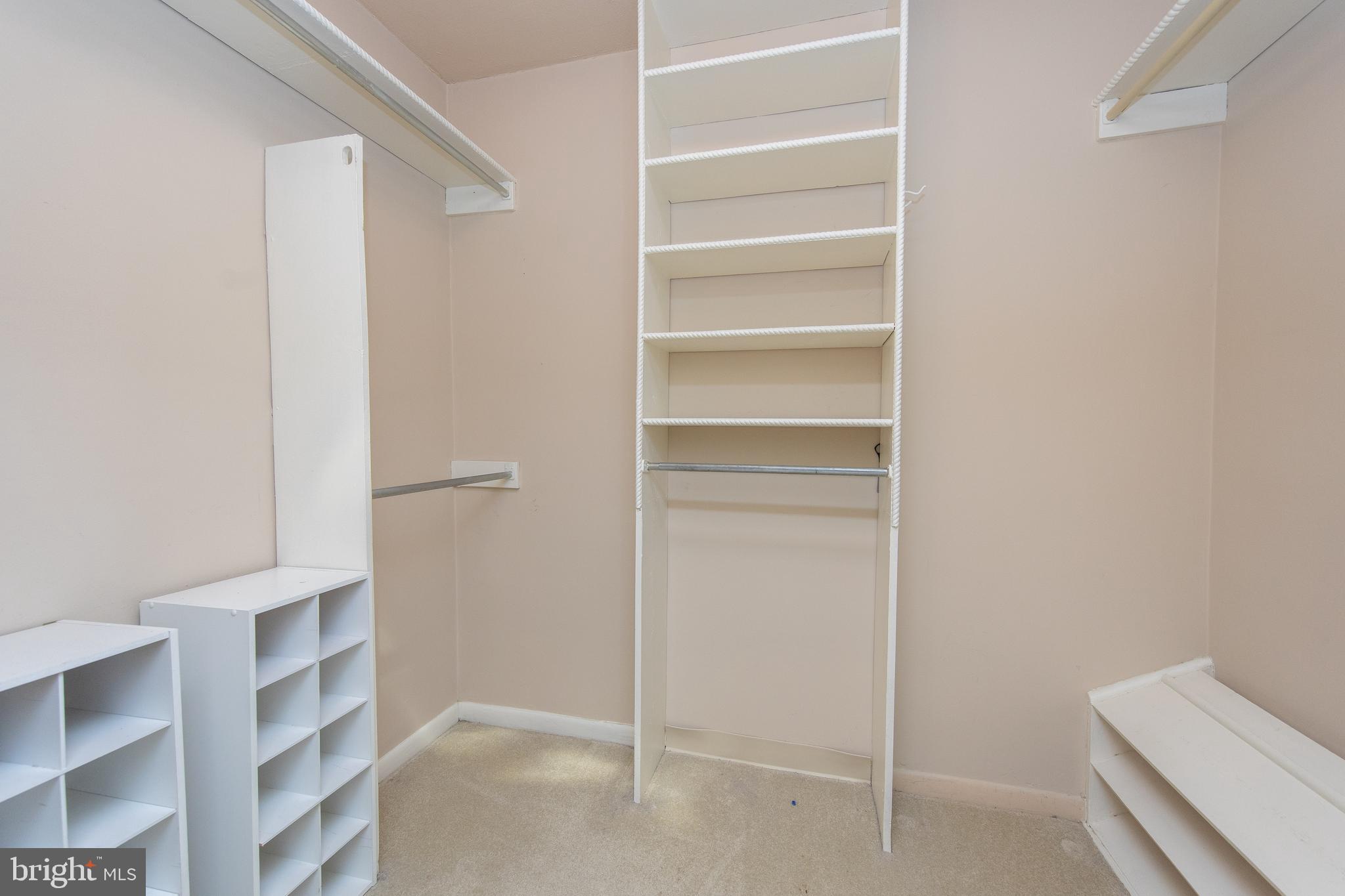 7900 Old York Road, Unit 906A Elkins Park, PA 19027 - Photo 30 of 42 a view of walk in closet with empty racks