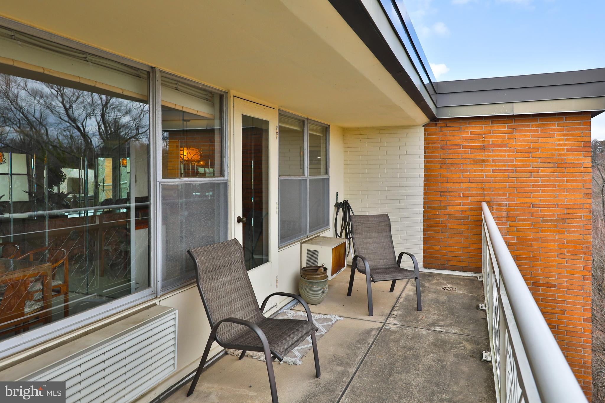 7900 Old York Road, Unit 906A Elkins Park, PA 19027 - Photo 36 of 42 a building outdoor space with patio furniture