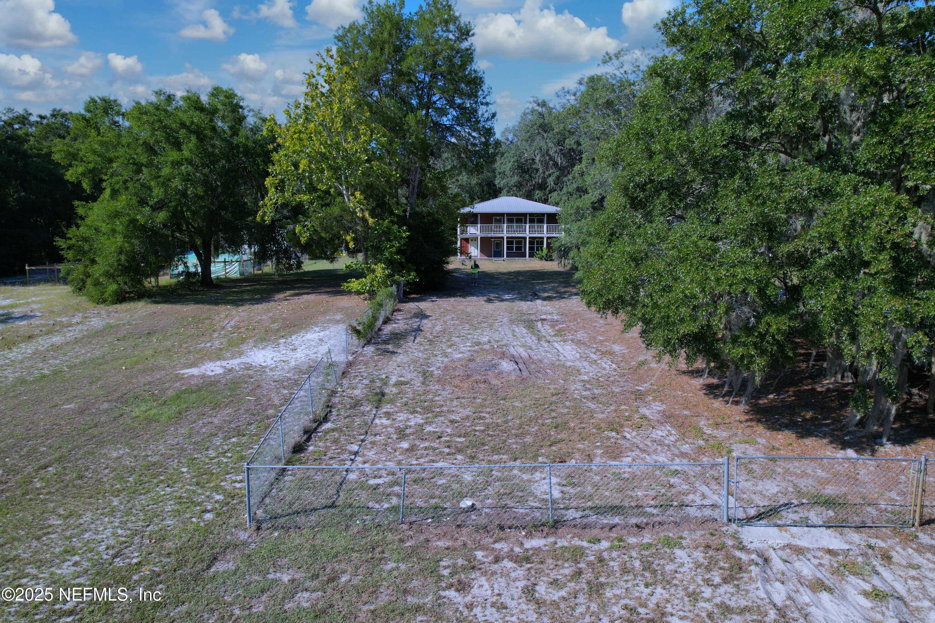5756 Southeast 55th Terrace Keystone Heights, FL 32656 - Photo 32 of 35 a view of a house with a yard