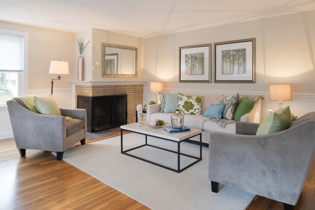 8 Puritan Road Marblehead, MA 01945 - Photo 14 of 25 a living room with furniture and a fireplace