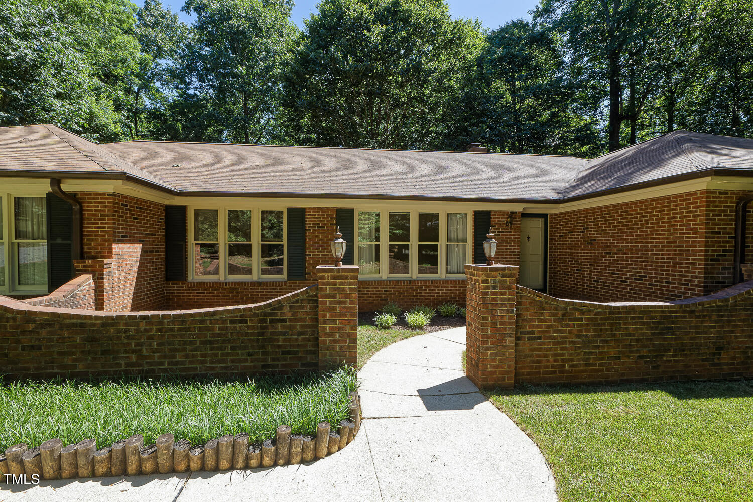 6013 Splitrock Trail Apex, NC 27539 - Photo 2 of 53 a front view of a house with a yard